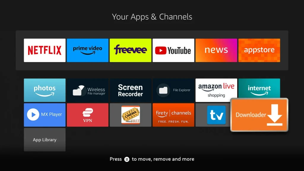 Home screen application grid showcasing the highlighted option to open Downloader app for an iptv setup